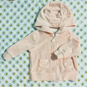 Carter’s light pink hoodie with bear ears.